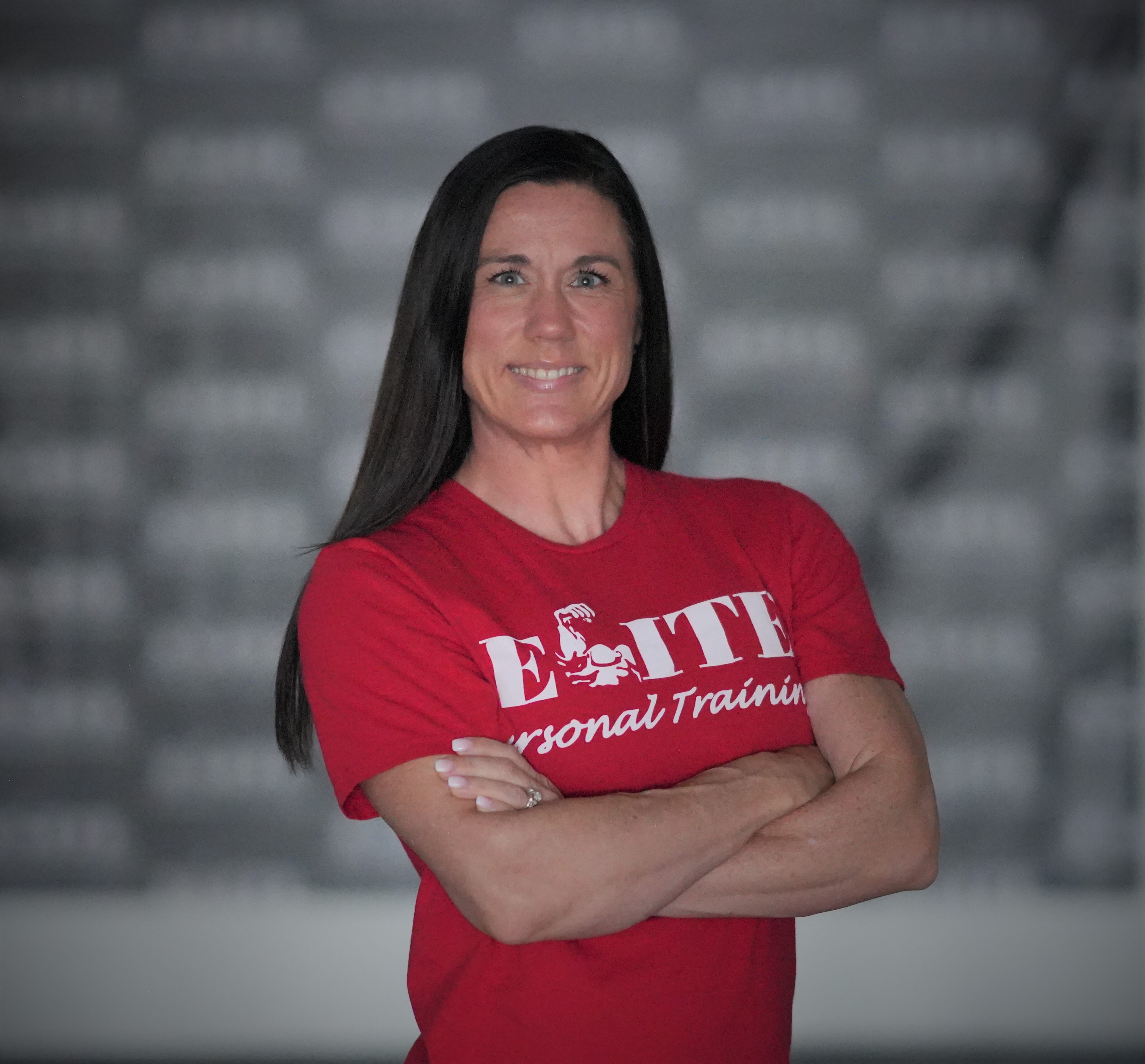 Jennifer Schulze coaching a woman through strength training to build confidence and improve health.