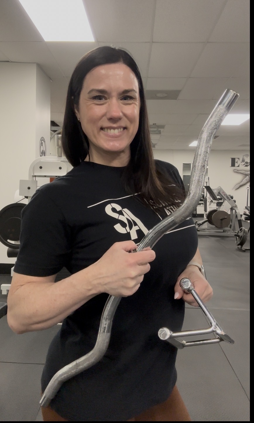Personal trainer demonstrating underhand, neutral close, and wide grip cable rows to show how grip choice affects back muscle activation